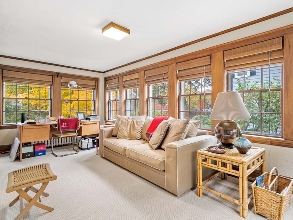 8 Whitney Road Newton, MA 02460 - Photo 11 of 25 a living room with furniture and a large window