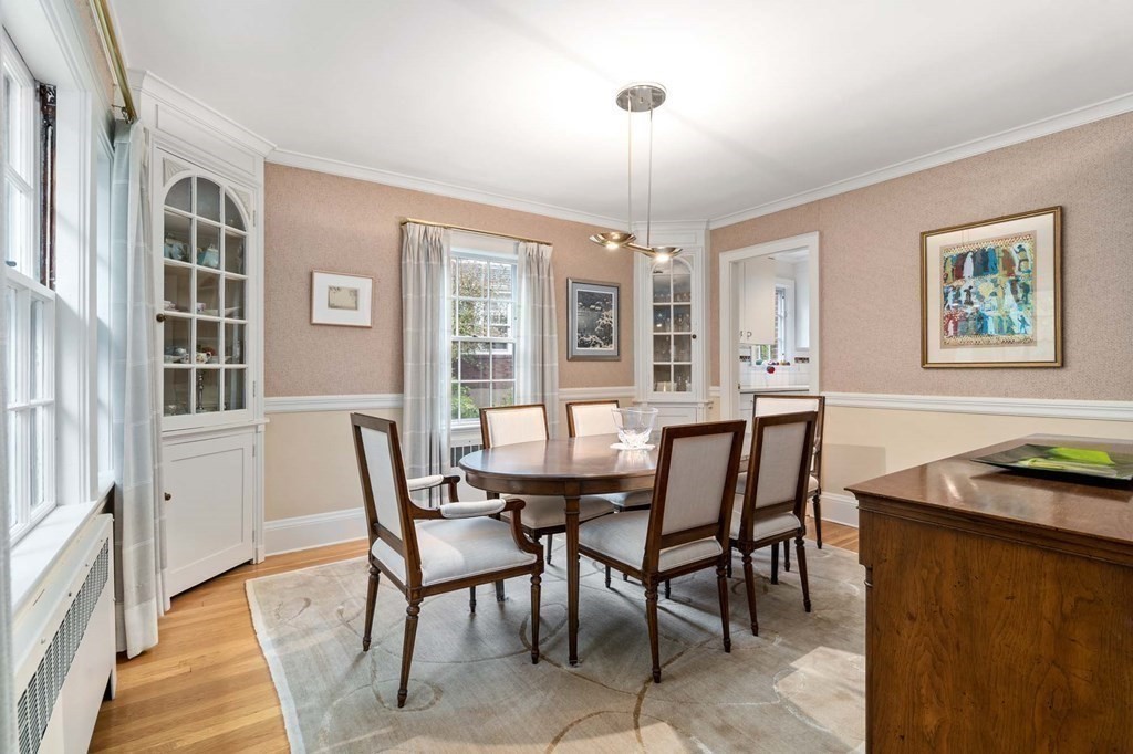 8 Whitney Road Newton, MA 02460 - Photo 12 of 25 a view of a dining room with furniture window and wooden floor
