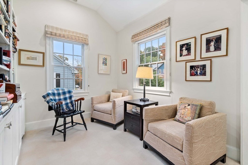 8 Whitney Road Newton, MA 02460 - Photo 15 of 25 a living room with furniture and a window