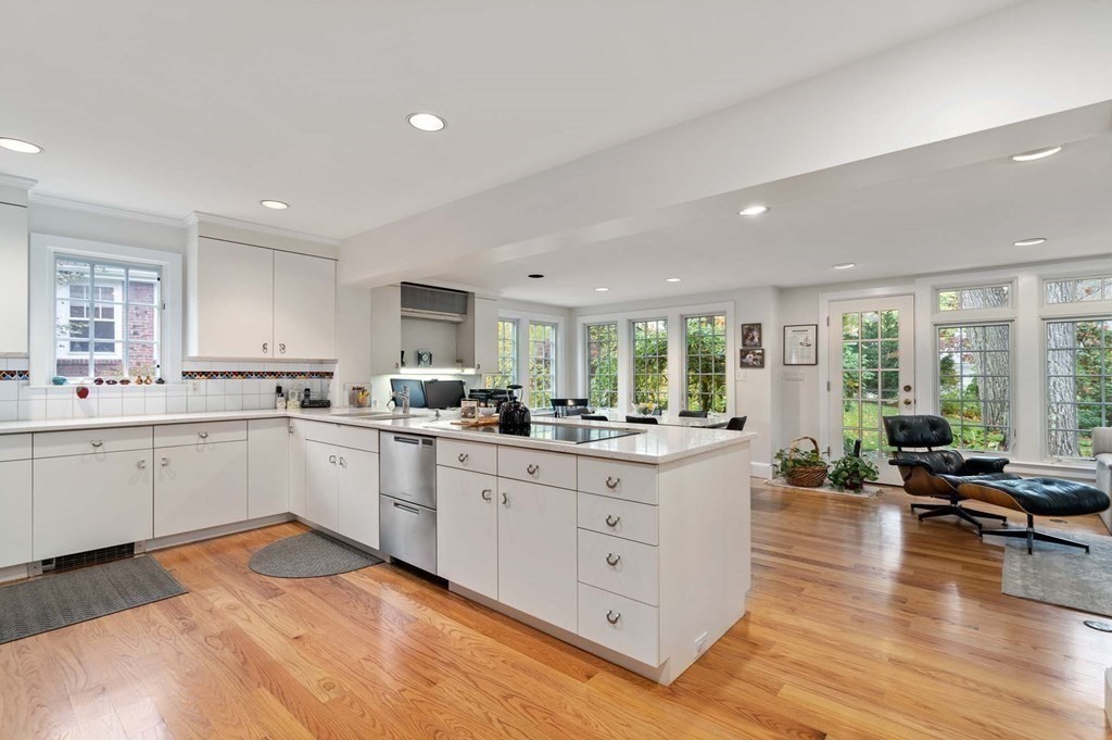 8 Whitney Road Newton, MA 02460 - Photo 4 of 25 a large kitchen with a large window and white cabinets