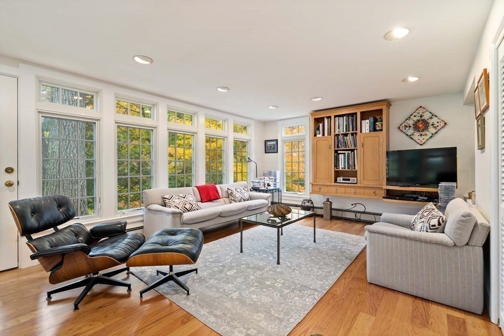 8 Whitney Road Newton, MA 02460 - Photo 7 of 25 a living room with furniture and a flat screen tv