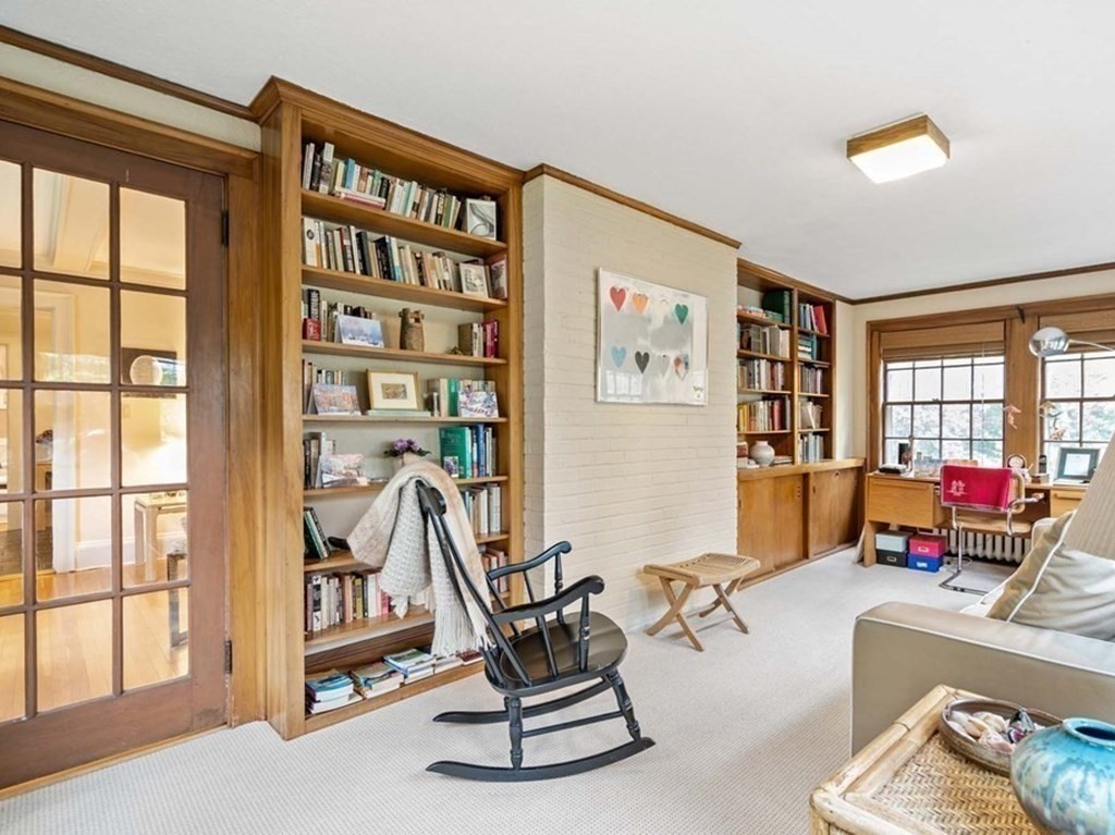 8 Whitney Road Newton, MA 02460 - Photo 10 of 25 a living room with furniture and large windows