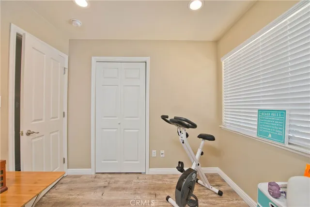 a bathroom with a sink toilet a mirror and shower