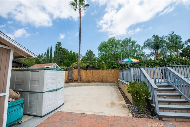 a view of swimming pool with chairs