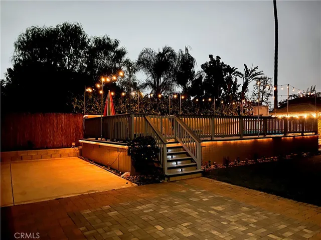 a view of swimming pool with outdoor seating and yard