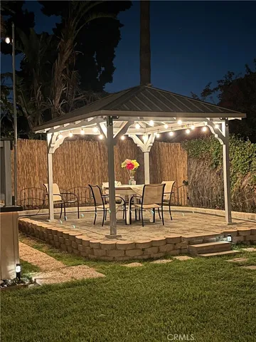 a view of a balcony with furniture