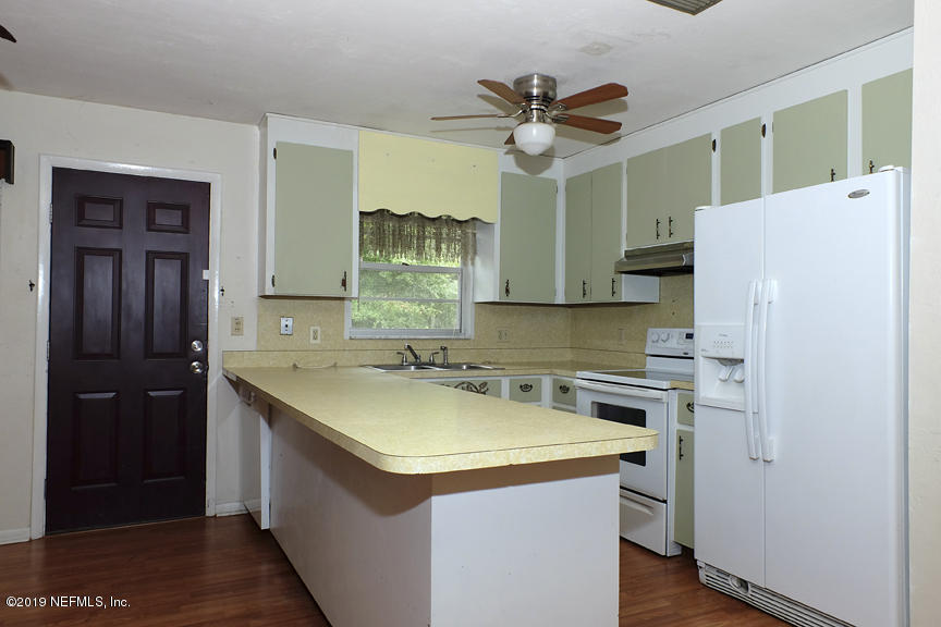6345 Little Lake Geneva Road Keystone Heights, FL 32656 - Photo 11 of 36 Kitchen/Breakfast Bar