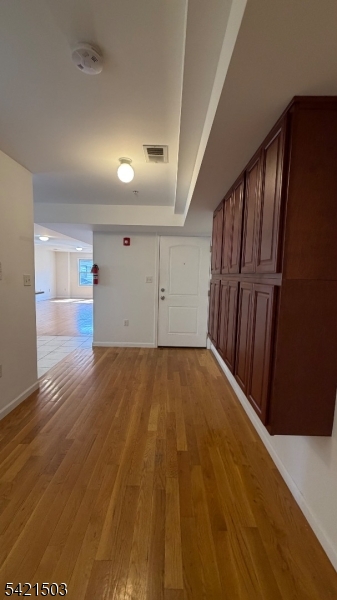 157 Lafayette Street, Unit 2 Newark, NJ 07105 - Photo 11 of 19 a view of empty room with wooden floor