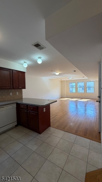157 Lafayette Street, Unit 2 Newark, NJ 07105 - Photo 7 of 19 a kitchen with stainless steel appliances granite countertop a sink and cabinets