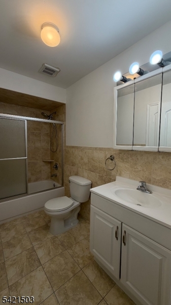 157 Lafayette Street, Unit 2 Newark, NJ 07105 - Photo 8 of 19 a bathroom with a sink a toilet and shower
