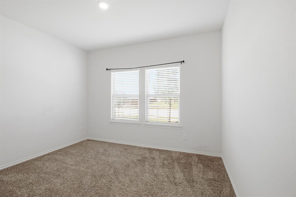 1328 Broaddus Road Forney, TX 75126 - Photo 21 of 31 Neutral-toned carpet flooring complements light wall finishes