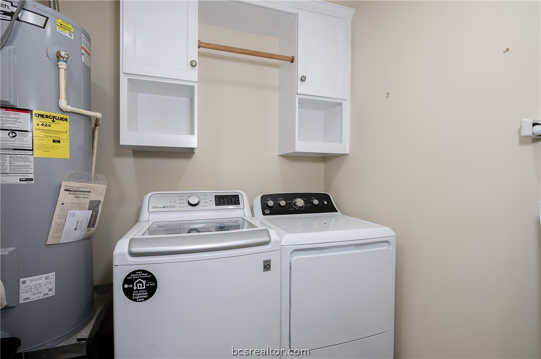 2302 Quail Run College Station, TX 77845 - Photo 20 of 49 a utility room with dryer and washer