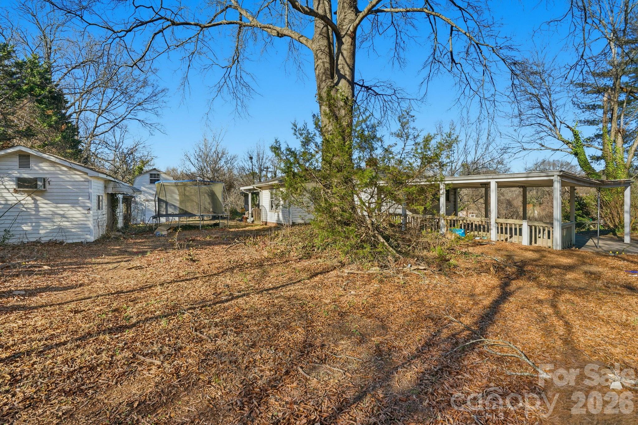 106 Fielding Road Charlotte, NC 28214 - Photo 7 of 10 a view of a house with a yard