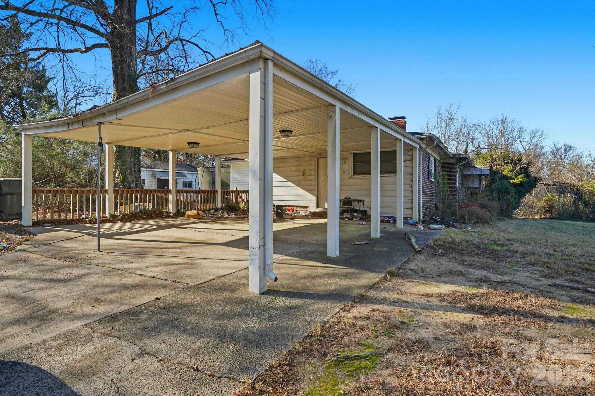 106 Fielding Road Charlotte, NC 28214 - Photo 8 of 10 a front view of a house with a porch