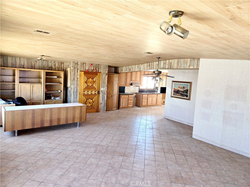 195 Old El Mirage Road Adelanto, CA 92301 - Photo 14 of 37 a living room with furniture and a flat screen tv