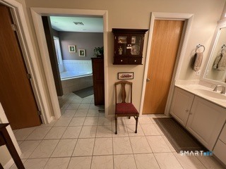 72 Pinnacle Road Ellington, CT 06029 - Photo 24 of 38 a bathroom with a sink and a mirror