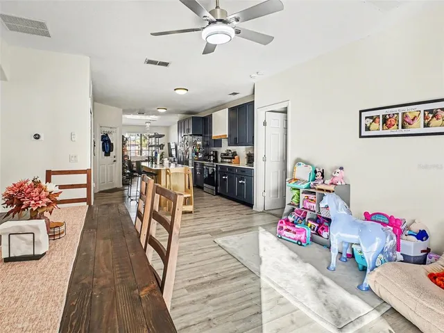 a view of a dining room with furniture