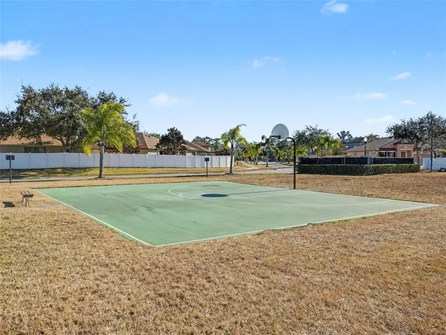 a view of a golf course with a lake