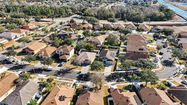 an aerial view of a city with lots of residential buildings