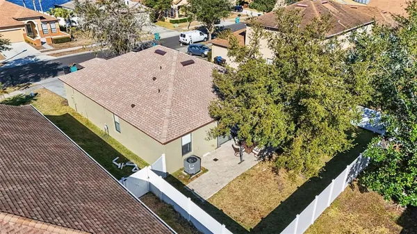 an aerial view of residential house with outdoor space