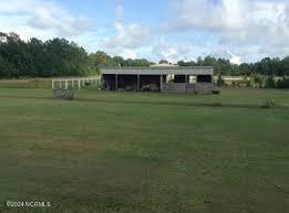 171 Preston Wells Road Holly Ridge, NC 28445 - Photo 50 of 61 Stables behind house across field