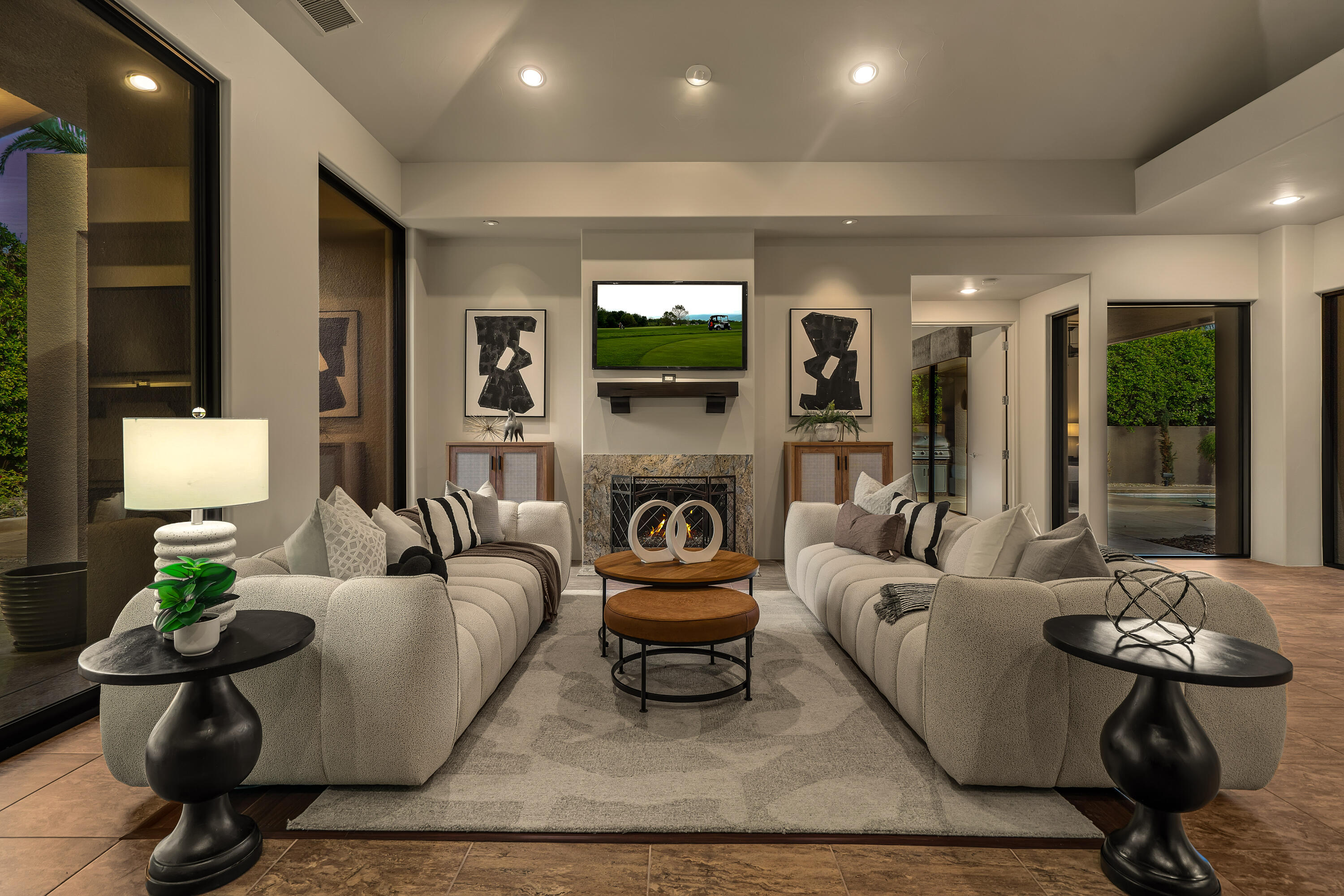 79200 Jack Rabbit Trail La Quinta, CA 92253 - Photo 24 of 76 a living room with furniture and a fireplace