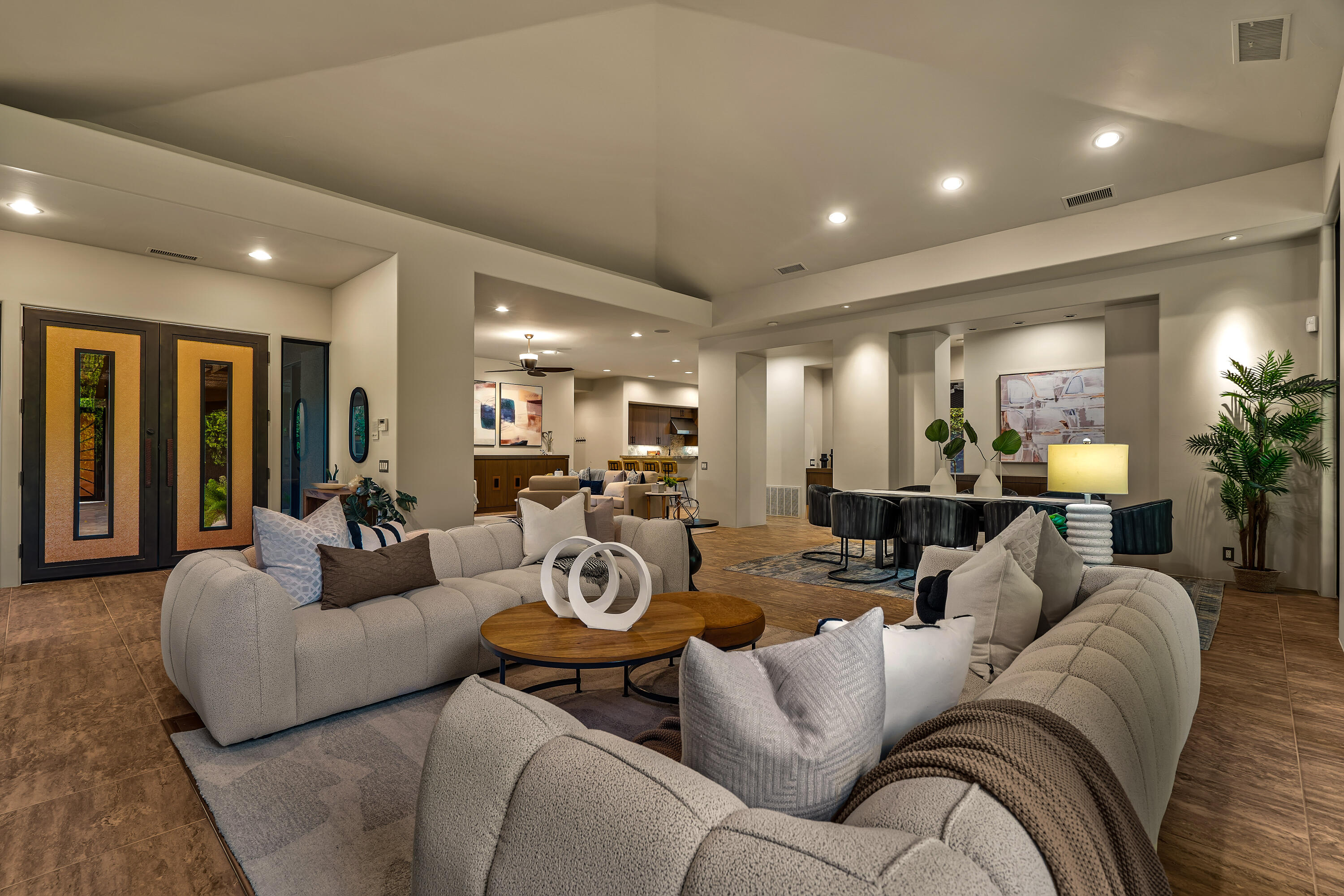 79200 Jack Rabbit Trail La Quinta, CA 92253 - Photo 27 of 76 a living room with furniture kitchen view and a large window