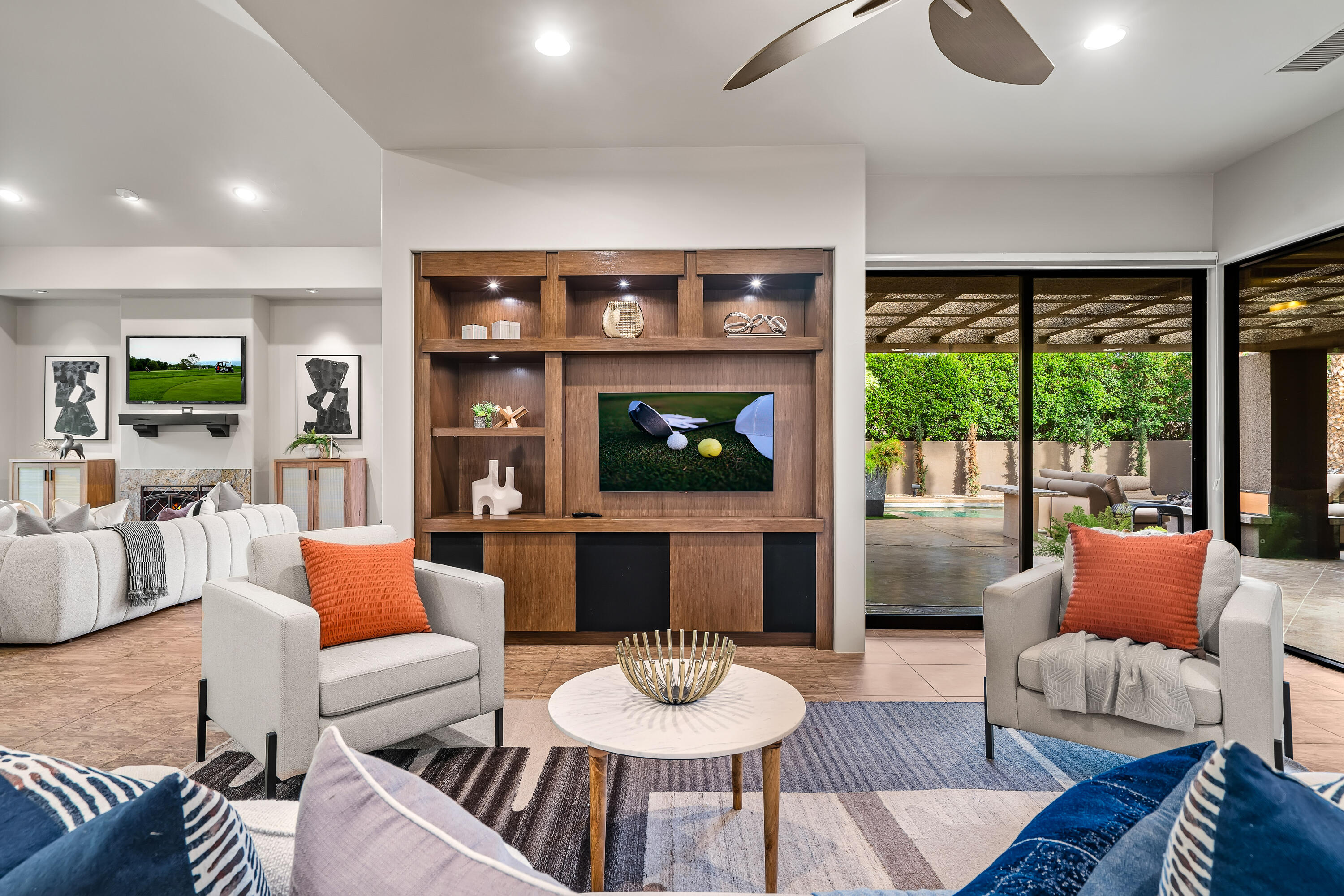 79200 Jack Rabbit Trail La Quinta, CA 92253 - Photo 31 of 76 a living room with furniture and a fireplace