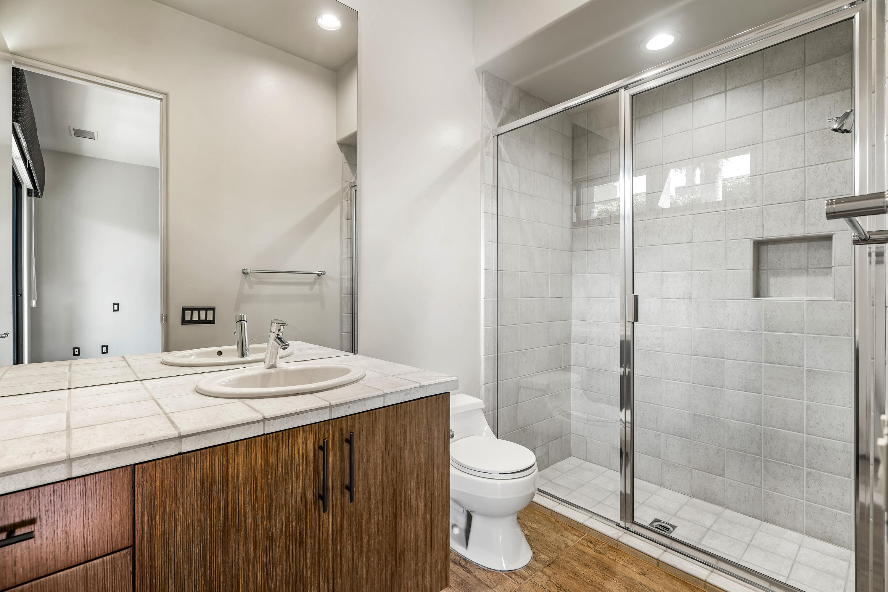 79200 Jack Rabbit Trail La Quinta, CA 92253 - Photo 49 of 76 a bathroom with a sink toilet and shower