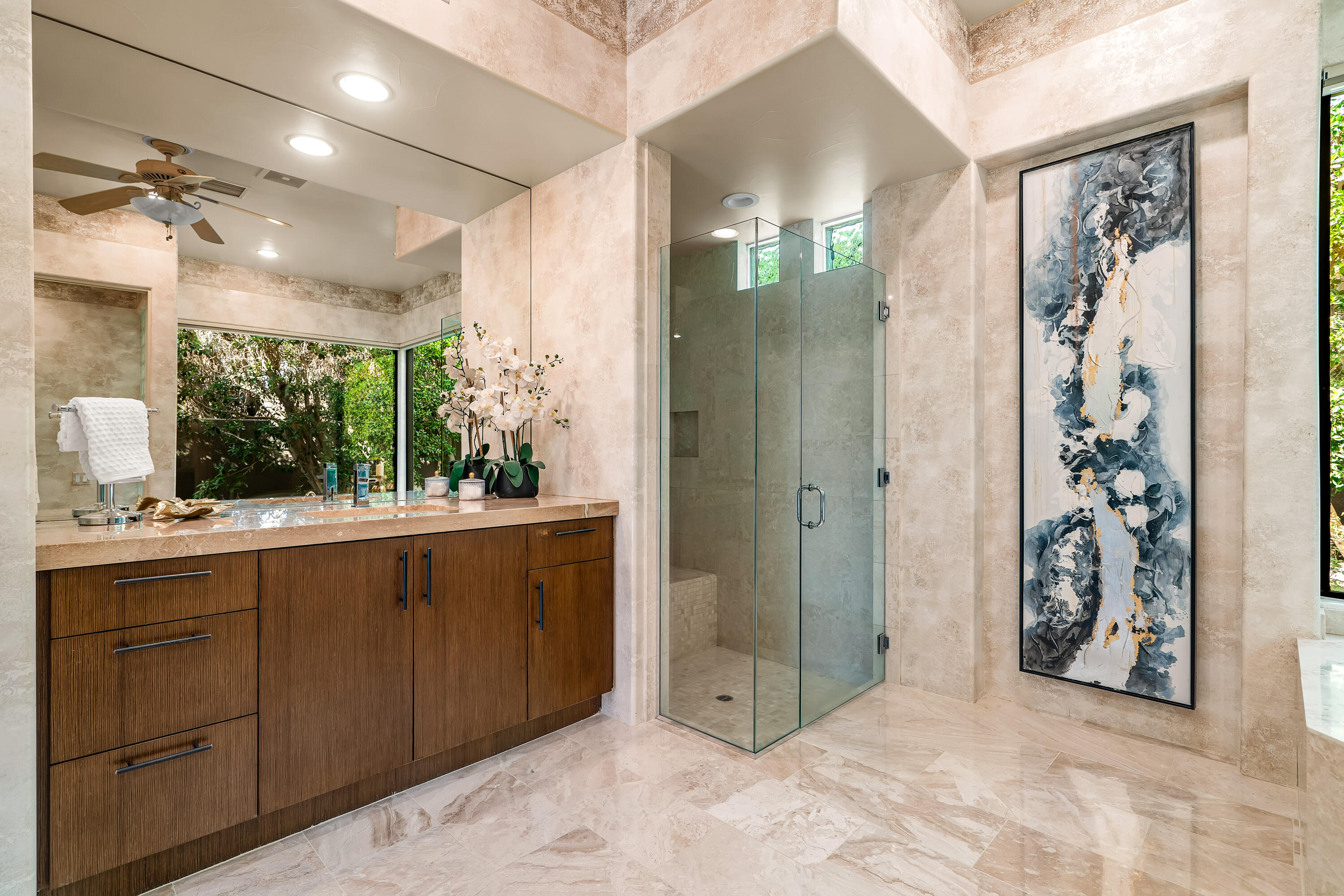79200 Jack Rabbit Trail La Quinta, CA 92253 - Photo 54 of 76 a bathroom with a sink mirror and shower