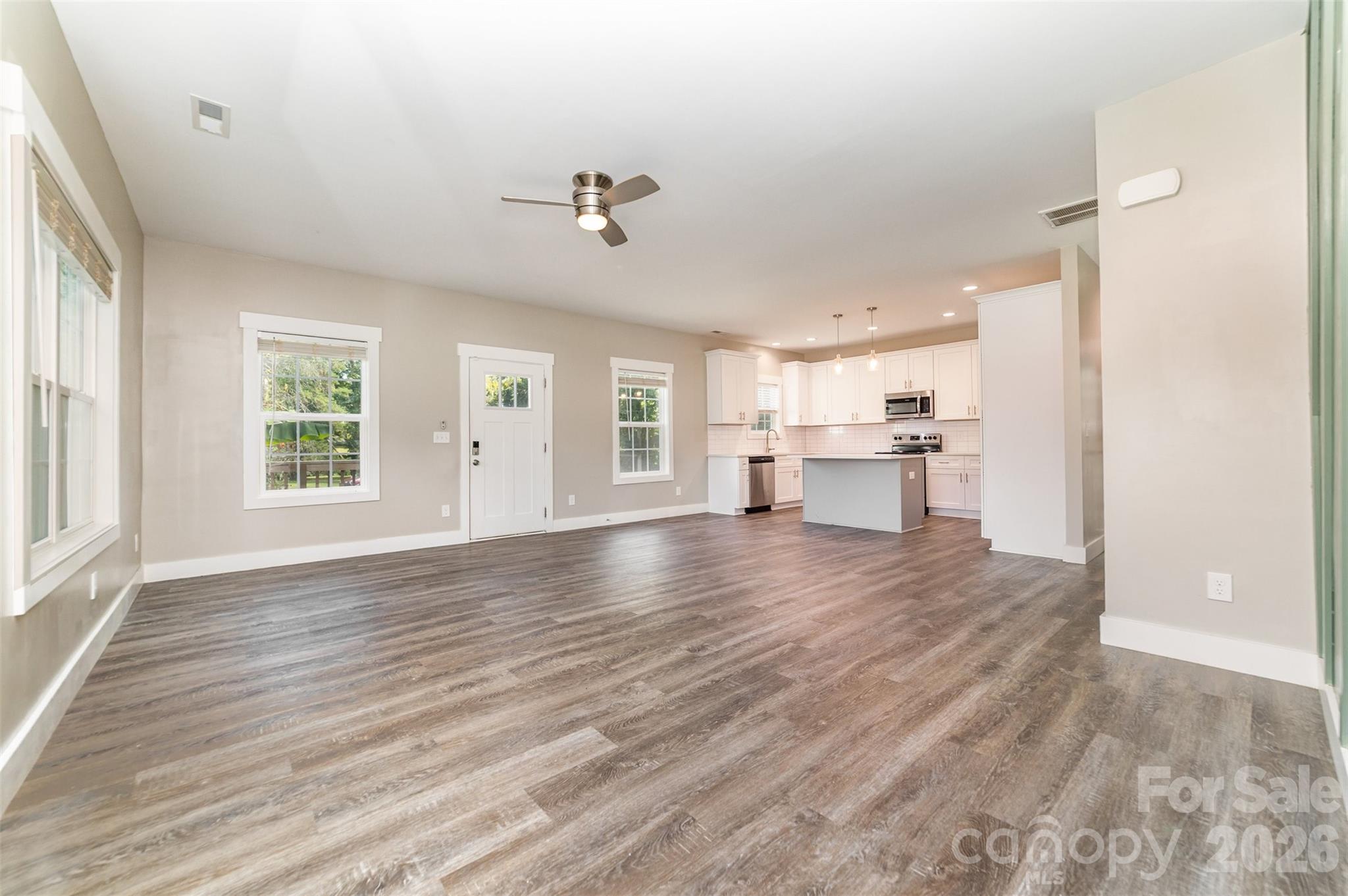 1003 Hunter Valley Road Shelby, NC 28150 - Photo 9 of 23 a view of empty room with wooden floor and window