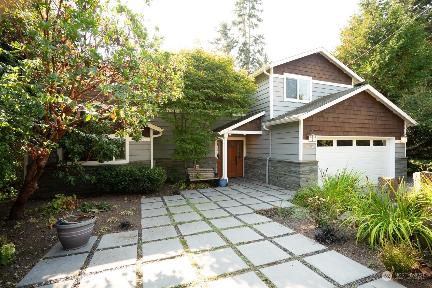 1239 Northwest 119th Street Seattle, WA 98177 - Photo 1 of 36 a view of a house with a yard