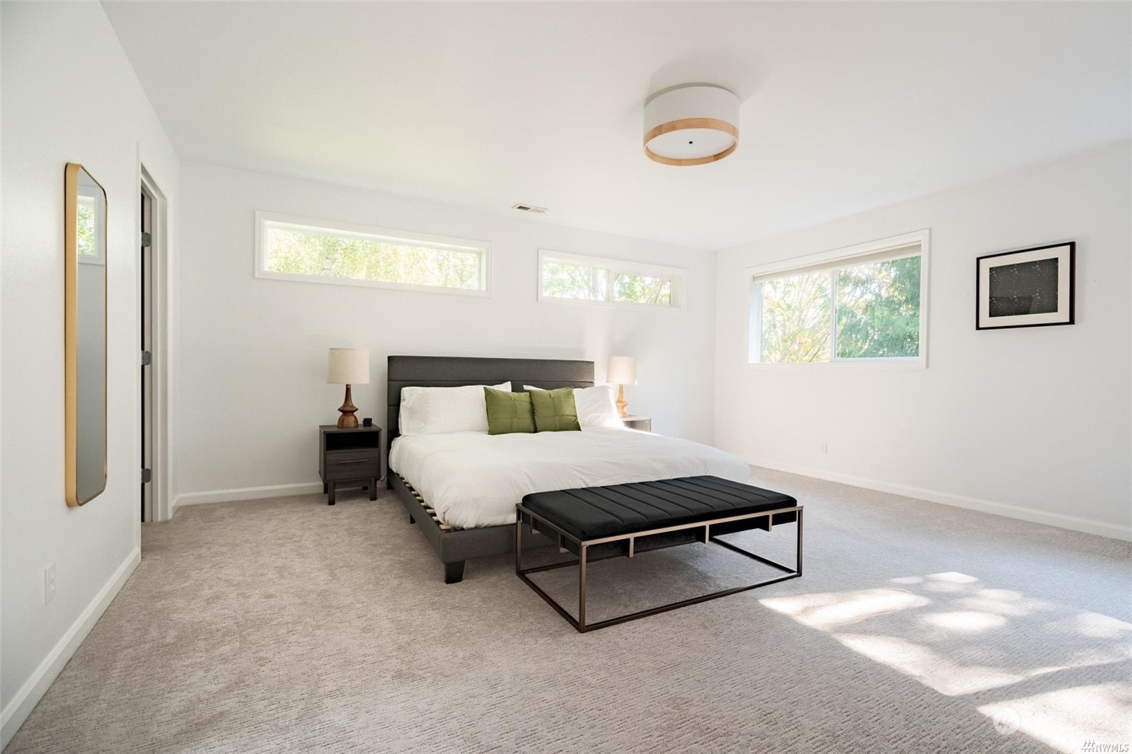 1239 Northwest 119th Street Seattle, WA 98177 - Photo 14 of 36 a spacious bedroom with a bed and window