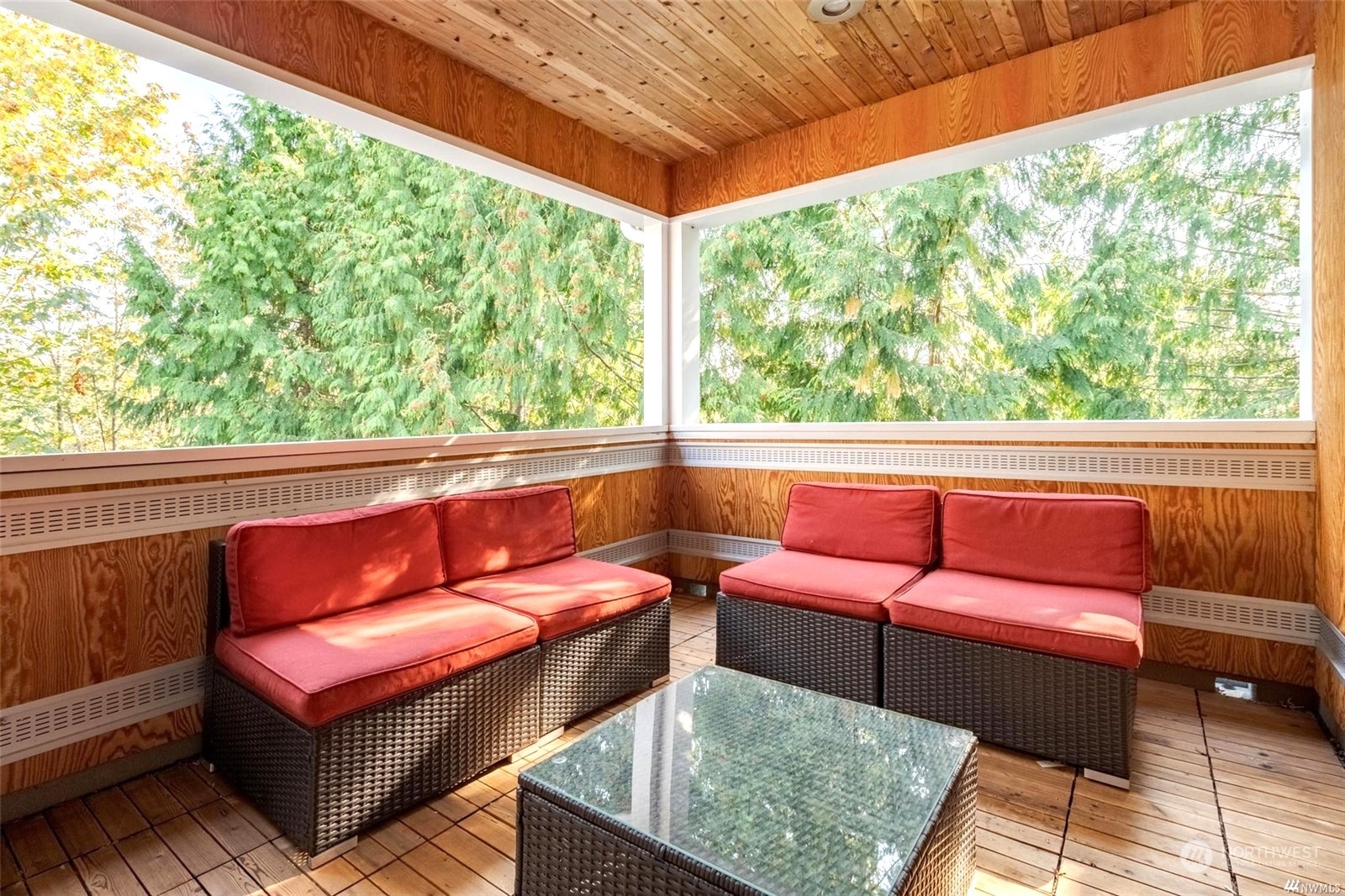 1239 Northwest 119th Street Seattle, WA 98177 - Photo 20 of 36 a blue bench sitting in front of a window