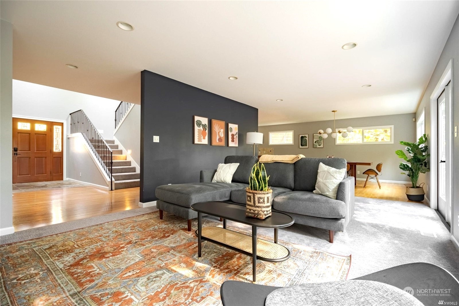 1239 Northwest 119th Street Seattle, WA 98177 - Photo 6 of 36 a living room with furniture and a wooden floor