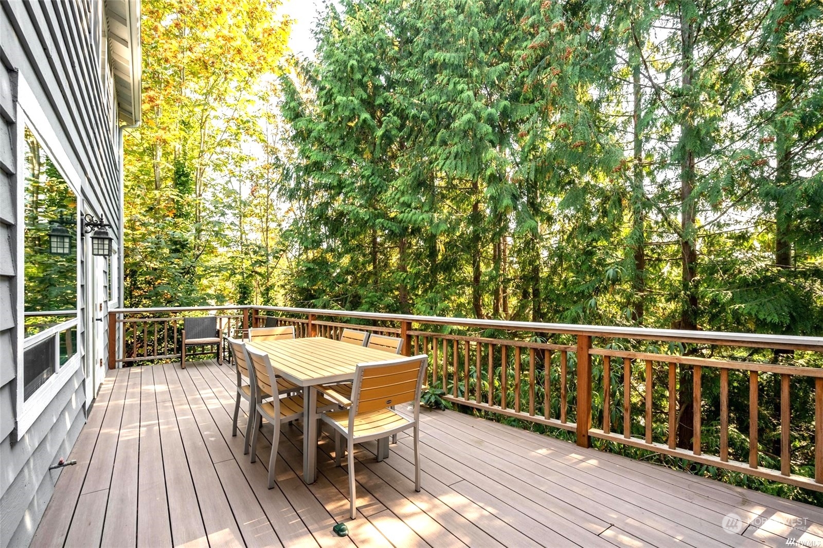 1239 Northwest 119th Street Seattle, WA 98177 - Photo 8 of 36 a view of a chairs and table on the wooden deck