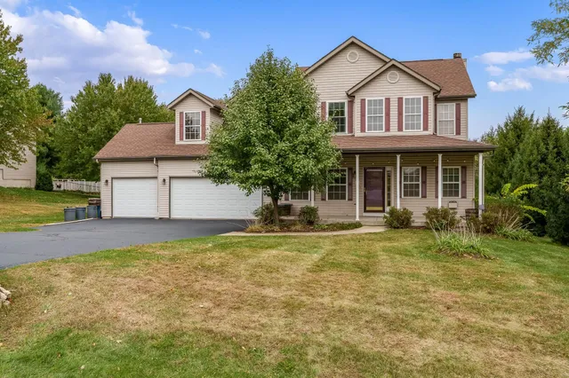a house view with a garden space
