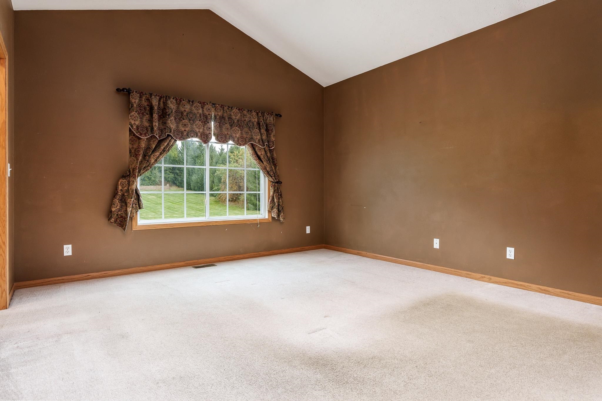 5166 East Hubbard Trail Byron, IL 61010 - Photo 21 of 42 an empty room with windows