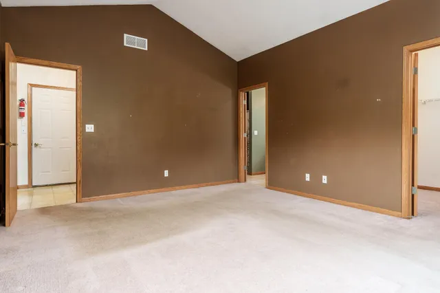 a view of a room with racks on the wall