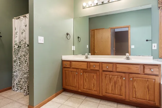 a bathroom with a bathtub and a sink