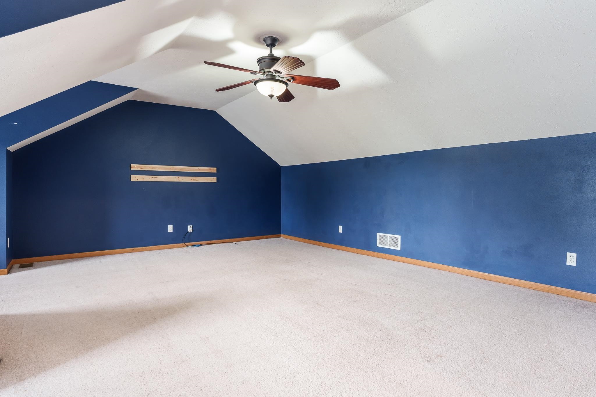 5166 East Hubbard Trail Byron, IL 61010 - Photo 33 of 42 a view of an empty room with a fan