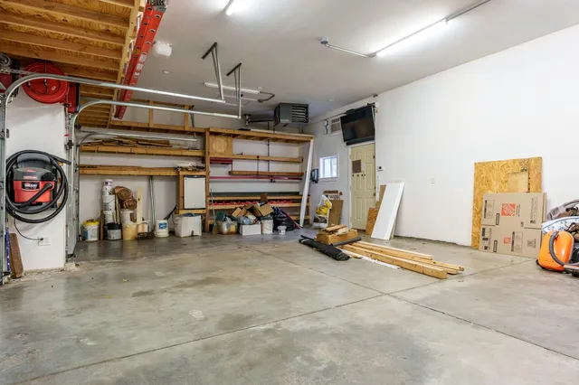 a view of a room with wooden walls