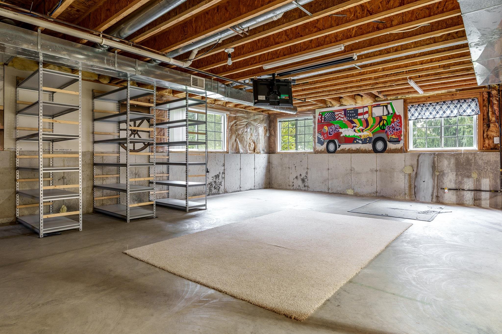 5166 East Hubbard Trail Byron, IL 61010 - Photo 39 of 42 a view of an empty room with storage and utility