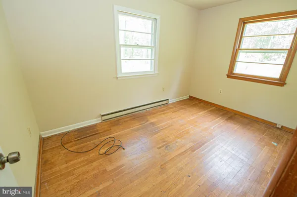 an empty room with windows