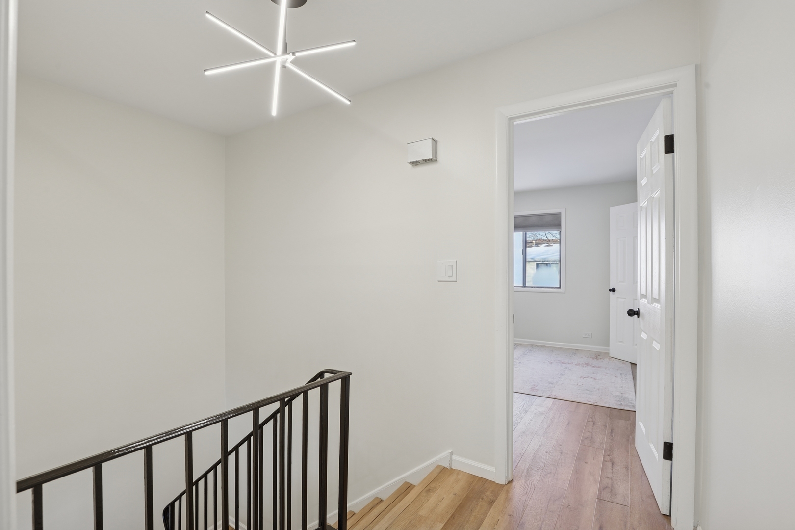 625 Breakers Point Schaumburg, IL 60194 - Photo 14 of 25 a view of a hallway with wooden floor