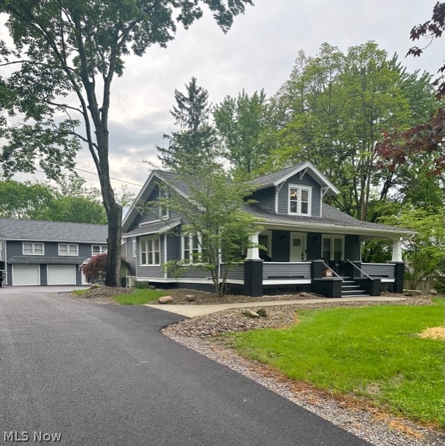 4652 South Turner Road Canfield, OH 44406 - Photo 1 of 28 View of front of house featuring a porch and a garage