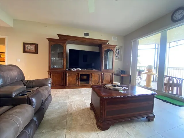 a kitchen with a refrigerator a stove a sink and a cabinets