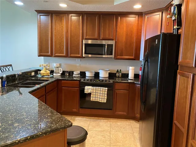 a bedroom with a bed and a view of bathroom