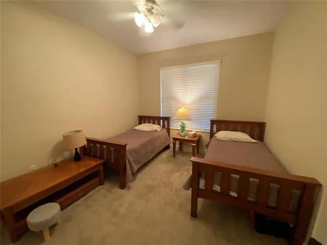 a room with furniture and a large window