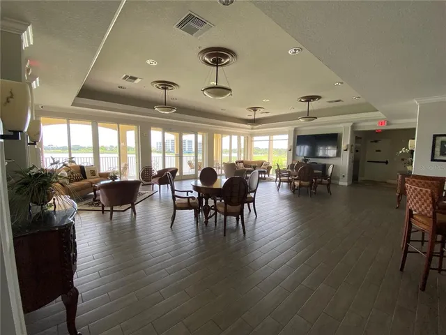 a view of a lake with houses in the back